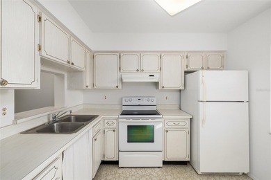 Tucked at the end of the road in Pinehurst Village, this on The Dunedin Country Club in Florida - for sale on GolfHomes.com, golf home, golf lot