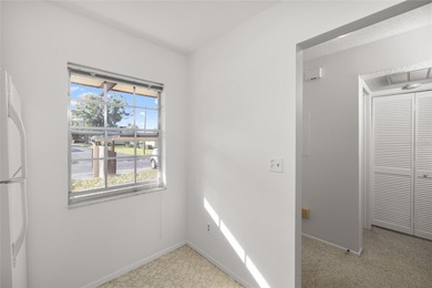 Tucked at the end of the road in Pinehurst Village, this on The Dunedin Country Club in Florida - for sale on GolfHomes.com, golf home, golf lot