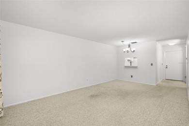 Tucked at the end of the road in Pinehurst Village, this on The Dunedin Country Club in Florida - for sale on GolfHomes.com, golf home, golf lot