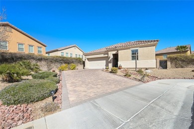 Discover your dream home in this guard-gated golf course on Rhodes Ranch Golf Club in Nevada - for sale on GolfHomes.com, golf home, golf lot