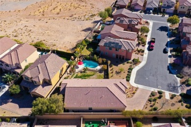 Discover your dream home in this guard-gated golf course on Rhodes Ranch Golf Club in Nevada - for sale on GolfHomes.com, golf home, golf lot