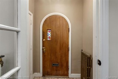 Timeless Tudor architecture and abundant natural light define on Detroit Golf Club  in Michigan - for sale on GolfHomes.com, golf home, golf lot