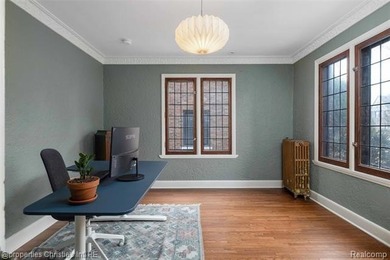 Timeless Tudor architecture and abundant natural light define on Detroit Golf Club  in Michigan - for sale on GolfHomes.com, golf home, golf lot