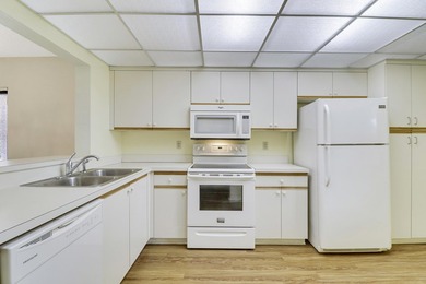 Enjoy panoramic golf and lake views from this 2 bedroom, 2 bath on  in Florida - for sale on GolfHomes.com, golf home, golf lot