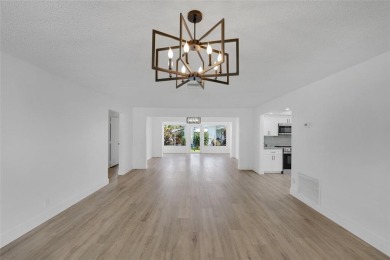Fully renovated THREE BEDROOM, 2 bath, 1 car garage single on Leisureville Community Association in Florida - for sale on GolfHomes.com, golf home, golf lot