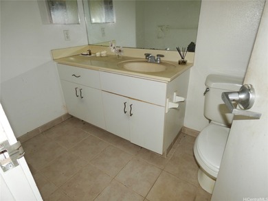 Situated on a nicely sized flag lot in Ewa Villages close to on Coral Creek Golf Course in Hawaii - for sale on GolfHomes.com, golf home, golf lot