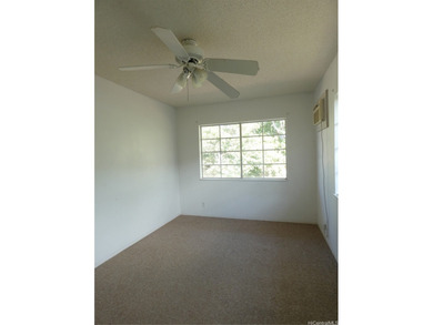 Situated on a nicely sized flag lot in Ewa Villages close to on Coral Creek Golf Course in Hawaii - for sale on GolfHomes.com, golf home, golf lot