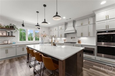 Stunning custom home on the 13th fairway in Traditions of on Traditions of Braselton Golf Club in Georgia - for sale on GolfHomes.com, golf home, golf lot