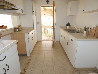 Situated on a nicely sized flag lot in Ewa Villages close to on Coral Creek Golf Course in Hawaii - for sale on GolfHomes.com, golf home, golf lot