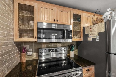 Escape to coastal luxury in this exquisite two-bedroom two-bath on Sandestin Golf and Beach Resort - Raven in Florida - for sale on GolfHomes.com, golf home, golf lot