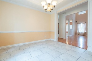 Quiet and spacious living with beautiful water views. This 4 on Stumpy Lake Golf Course in Virginia - for sale on GolfHomes.com, golf home, golf lot