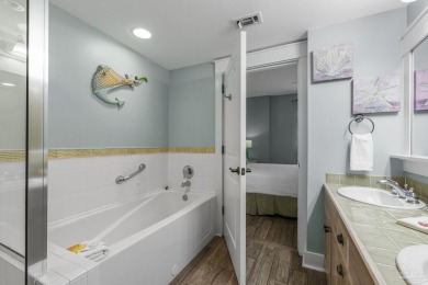 Escape to coastal luxury in this exquisite two-bedroom two-bath on Sandestin Golf and Beach Resort - Raven in Florida - for sale on GolfHomes.com, golf home, golf lot