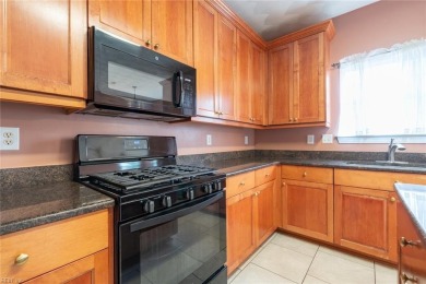 Quiet and spacious living with beautiful water views. This 4 on Stumpy Lake Golf Course in Virginia - for sale on GolfHomes.com, golf home, golf lot