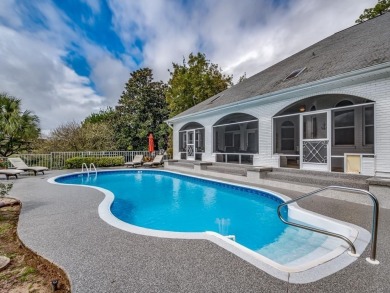 1-story all 4-sides brick pool home with beautiful views of the on The Golf Club At Summerbrooke in Florida - for sale on GolfHomes.com, golf home, golf lot