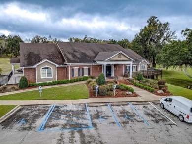 1-story all 4-sides brick pool home with beautiful views of the on The Golf Club At Summerbrooke in Florida - for sale on GolfHomes.com, golf home, golf lot