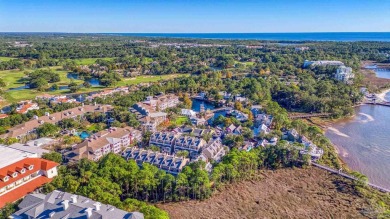 Escape to coastal luxury in this exquisite two-bedroom two-bath on Sandestin Golf and Beach Resort - Raven in Florida - for sale on GolfHomes.com, golf home, golf lot