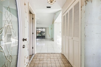 Investor Special in Sun City Center - Spacious 2/2 Fixer Upper on Caloosa Greens Executive Golf Course in Florida - for sale on GolfHomes.com, golf home, golf lot