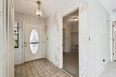 Investor Special in Sun City Center - Spacious 2/2 Fixer Upper on Caloosa Greens Executive Golf Course in Florida - for sale on GolfHomes.com, golf home, golf lot