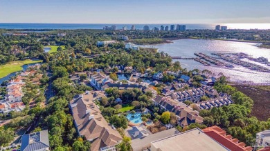 Escape to coastal luxury in this exquisite two-bedroom two-bath on Sandestin Golf and Beach Resort - Raven in Florida - for sale on GolfHomes.com, golf home, golf lot