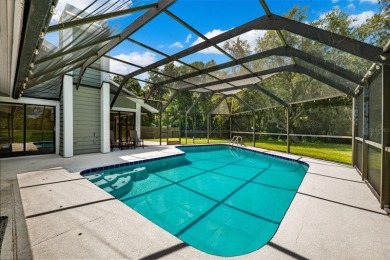 **Beautiful single story split floor plan at the end of a on East Lake Woodlands Country Club in Florida - for sale on GolfHomes.com, golf home, golf lot