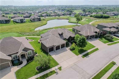 This stunning reverse 1.5-story home in Creekmoor offers an on Golf Club of Creekmoor in Missouri - for sale on GolfHomes.com, golf home, golf lot
