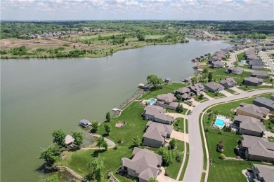 This stunning reverse 1.5-story home in Creekmoor offers an on Golf Club of Creekmoor in Missouri - for sale on GolfHomes.com, golf home, golf lot