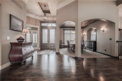 This stunning reverse 1.5-story home in Creekmoor offers an on Golf Club of Creekmoor in Missouri - for sale on GolfHomes.com, golf home, golf lot