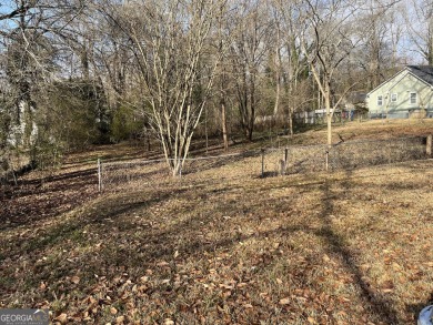 Prime opportunity to own a vacant land lot in the heart of on Browns Mill Golf Course in Georgia - for sale on GolfHomes.com, golf home, golf lot