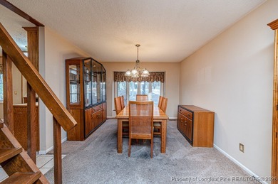 Experience comfortable, low-maintenance living in the gated golf on Carolina Trace Country Club in North Carolina - for sale on GolfHomes.com, golf home, golf lot