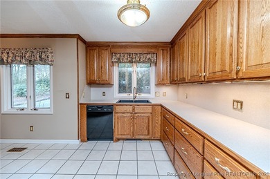 Experience comfortable, low-maintenance living in the gated golf on Carolina Trace Country Club in North Carolina - for sale on GolfHomes.com, golf home, golf lot