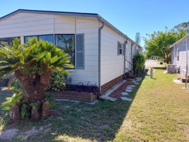 Beautifully updated center cul-de-sac partially furnished home on Lake Fairways Country Club in Florida - for sale on GolfHomes.com, golf home, golf lot