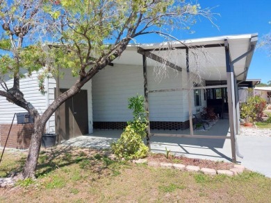 Beautifully updated center cul-de-sac partially furnished home on Lake Fairways Country Club in Florida - for sale on GolfHomes.com, golf home, golf lot