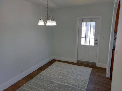 Beautifully updated center cul-de-sac partially furnished home on Lake Fairways Country Club in Florida - for sale on GolfHomes.com, golf home, golf lot