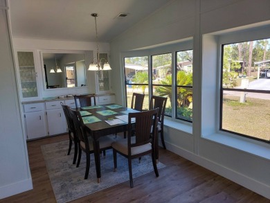Beautifully updated center cul-de-sac partially furnished home on Lake Fairways Country Club in Florida - for sale on GolfHomes.com, golf home, golf lot