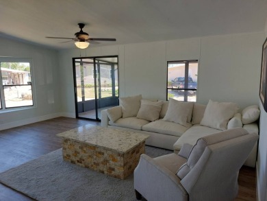 Beautifully updated center cul-de-sac partially furnished home on Lake Fairways Country Club in Florida - for sale on GolfHomes.com, golf home, golf lot