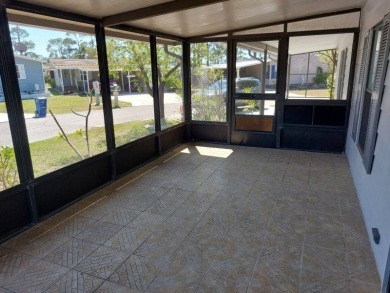 Beautifully updated center cul-de-sac partially furnished home on Lake Fairways Country Club in Florida - for sale on GolfHomes.com, golf home, golf lot