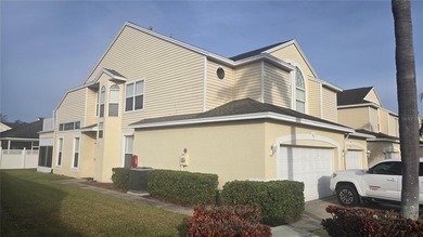 Welcome to this spacious corner-unit townhome in the highly on East Bay Golf Club in Florida - for sale on GolfHomes.com, golf home, golf lot