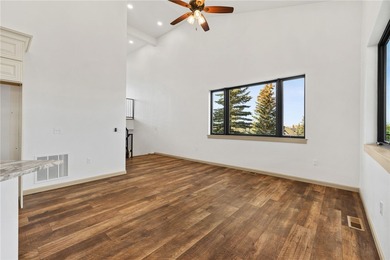 Enjoy sweeping mountain and golf course views from this on Red Lodge Golf Club in Montana - for sale on GolfHomes.com, golf home, golf lot