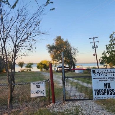 Wooded corner lot available in a lakefront community on Lake on Tawakoni Golf Course in Texas - for sale on GolfHomes.com, golf home, golf lot