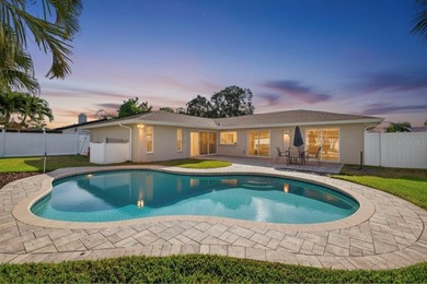 Nestled in the desirable Tanglewood neighborhood, this on Mangrove Bay Golf Course in Florida - for sale on GolfHomes.com, golf home, golf lot