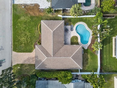 Nestled in the desirable Tanglewood neighborhood, this on Mangrove Bay Golf Course in Florida - for sale on GolfHomes.com, golf home, golf lot