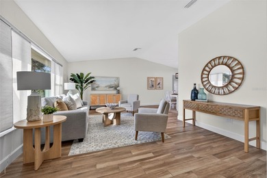 Nestled in the desirable Tanglewood neighborhood, this on Mangrove Bay Golf Course in Florida - for sale on GolfHomes.com, golf home, golf lot