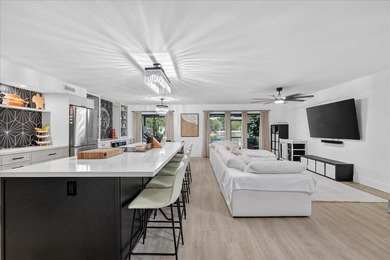 Spacious almost 2200 sq ft 3 bedroom 2.5 bath lakefront town on Jacaranda Golf Club in Florida - for sale on GolfHomes.com, golf home, golf lot