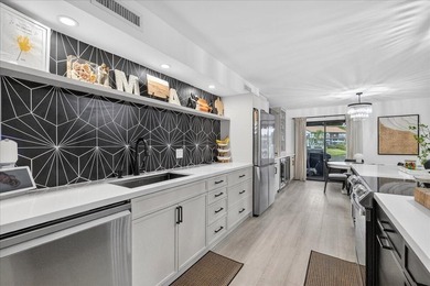 Spacious almost 2200 sq ft 3 bedroom 2.5 bath lakefront town on Jacaranda Golf Club in Florida - for sale on GolfHomes.com, golf home, golf lot