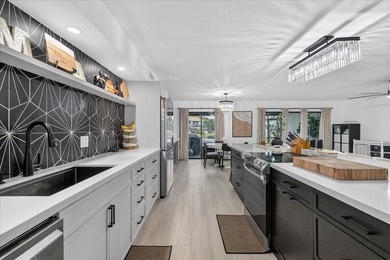 Spacious almost 2200 sq ft 3 bedroom 2.5 bath lakefront town on Jacaranda Golf Club in Florida - for sale on GolfHomes.com, golf home, golf lot