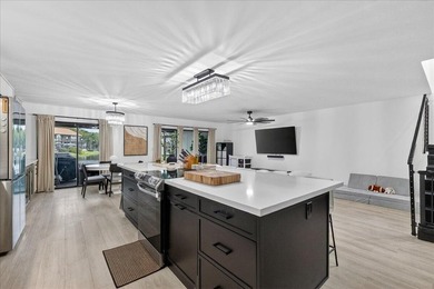 Spacious almost 2200 sq ft 3 bedroom 2.5 bath lakefront town on Jacaranda Golf Club in Florida - for sale on GolfHomes.com, golf home, golf lot