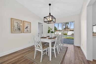 Nestled in the desirable Tanglewood neighborhood, this on Mangrove Bay Golf Course in Florida - for sale on GolfHomes.com, golf home, golf lot