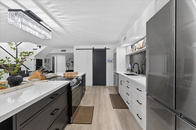 Spacious almost 2200 sq ft 3 bedroom 2.5 bath lakefront town on Jacaranda Golf Club in Florida - for sale on GolfHomes.com, golf home, golf lot