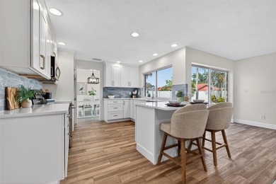 Nestled in the desirable Tanglewood neighborhood, this on Mangrove Bay Golf Course in Florida - for sale on GolfHomes.com, golf home, golf lot