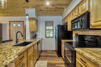 Fabulous furnished remodeled 2-bedroom, 2-bath cabin with on Bison Golf and Country Club in Arizona - for sale on GolfHomes.com, golf home, golf lot